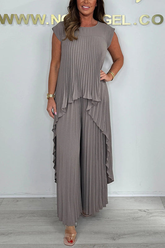 👗Completo composto da top midi irregolare a maniche corte plissettato Laney e pantaloni a gamba larga con elastico in vita✨