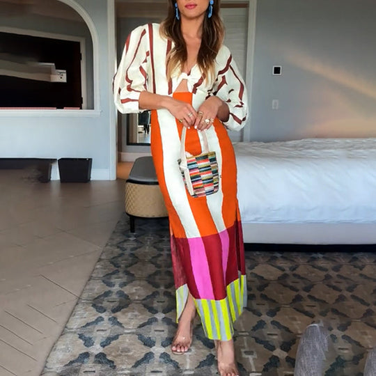 Abito lungo Kaya con maniche a sbuffo e nodo con stampa a blocchi di colore in misto lino